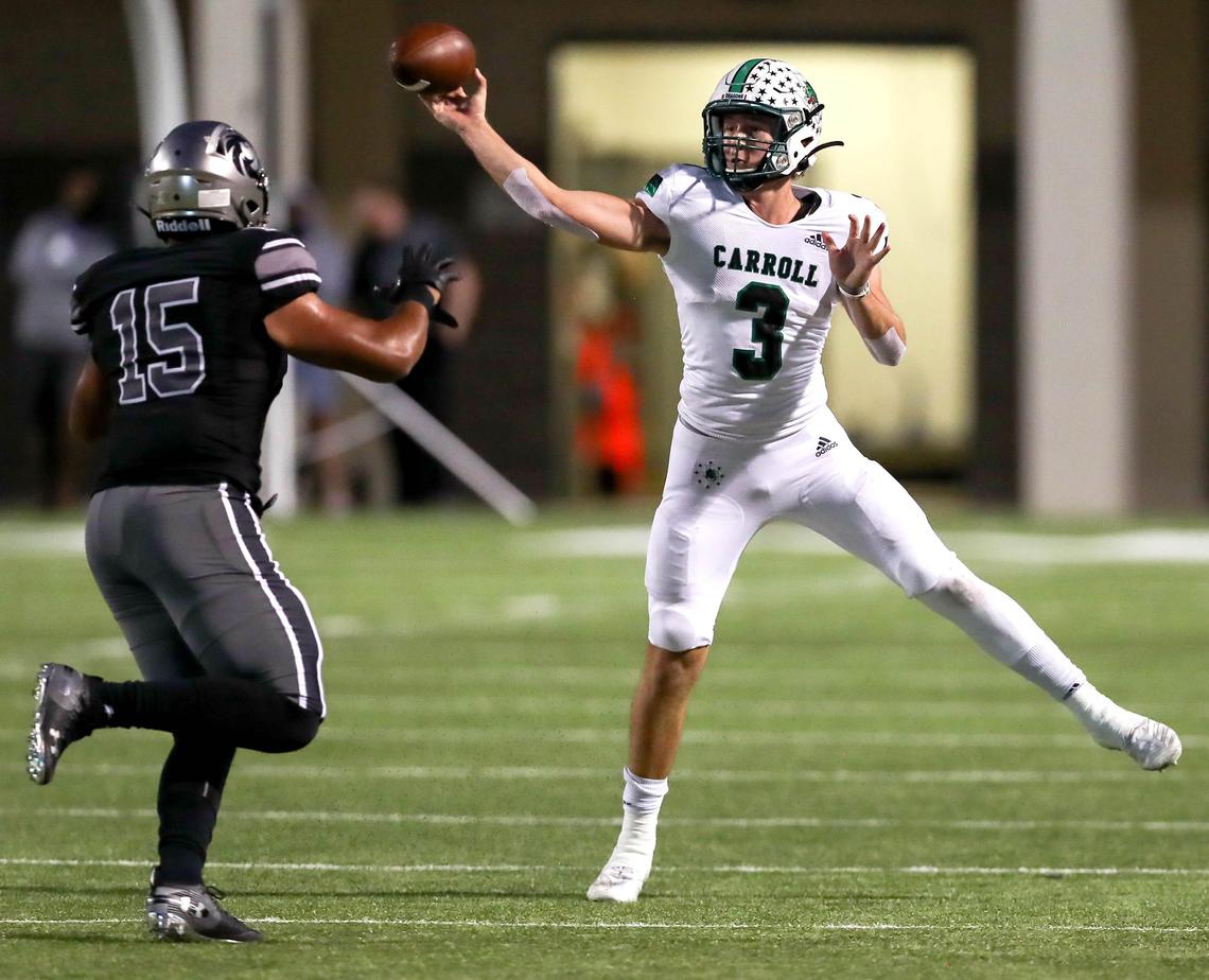 Southlake Carroll quarterback Quinn Ewers (3) tries to get off a pass against Denton Guyer defensive end Devin Goree (15) during the first half, Friday night, October 4, 2019 played at C.H. Collins Complex Stadium in Denton, TX.
