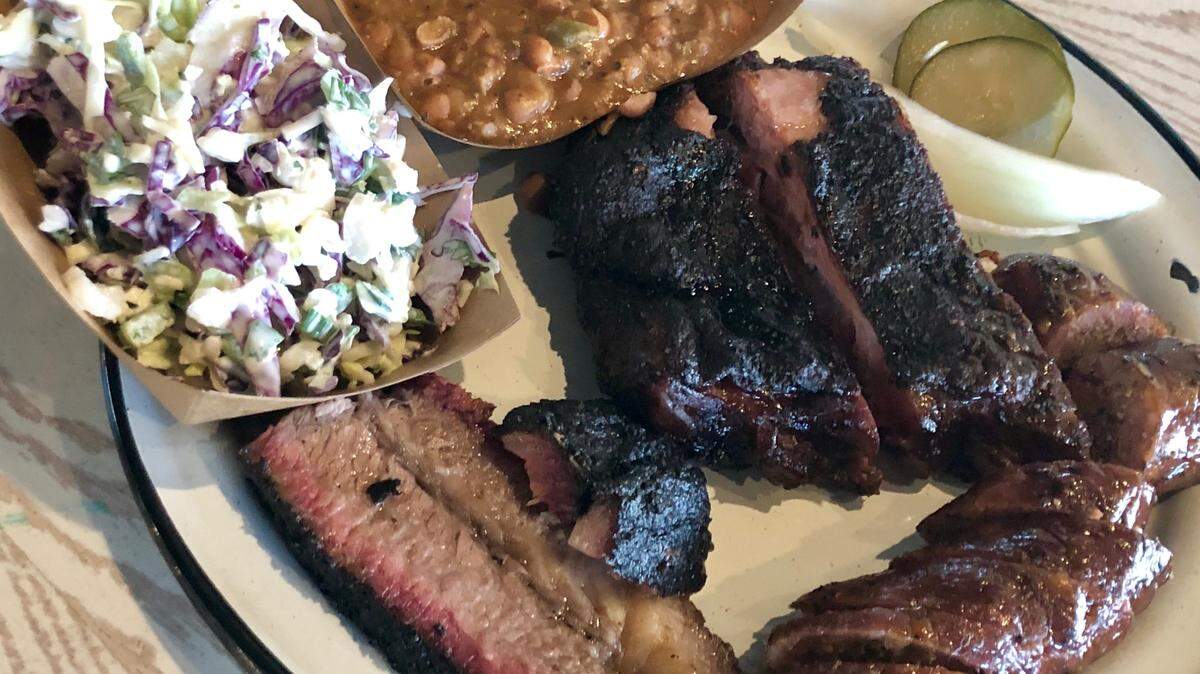 A combination plate at Brix Barbecue, one of several new restaurants inside the Americado Food Hall.