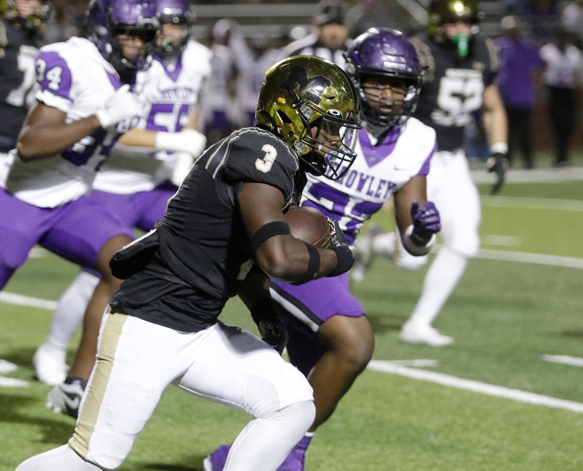 Mansfield’s Teddy Clark picks up yardage during a UIL football game at Newsome Stadium on Saturday , October 10, 2024.