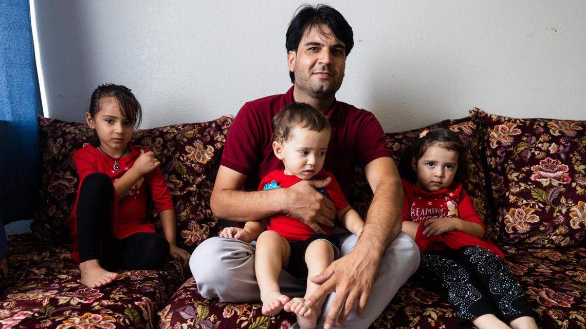 Basir Khan is an Afghan refugee waiting on a renewal on his work visa. His children are Shabir, 1; Fahima, 5; and Khatira, 2.