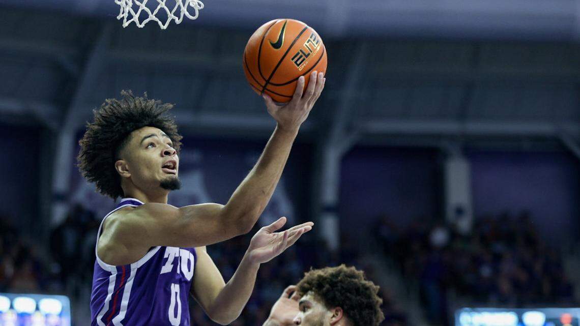 TCU guard Micah Peavy scores on a layup during their game against Texas at Schollmaier Arena in Fort Worth on Wednesday.