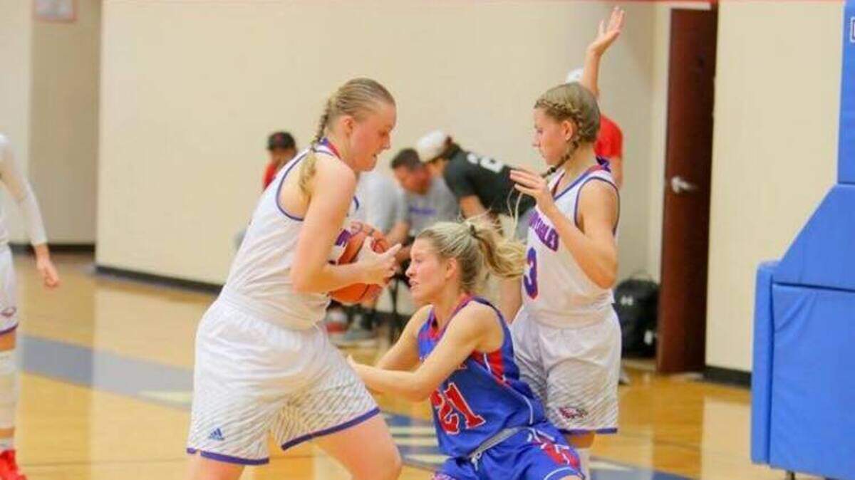 Lake Country junior Sage Taliaferro, left, and senior Brinley Kilpatrick