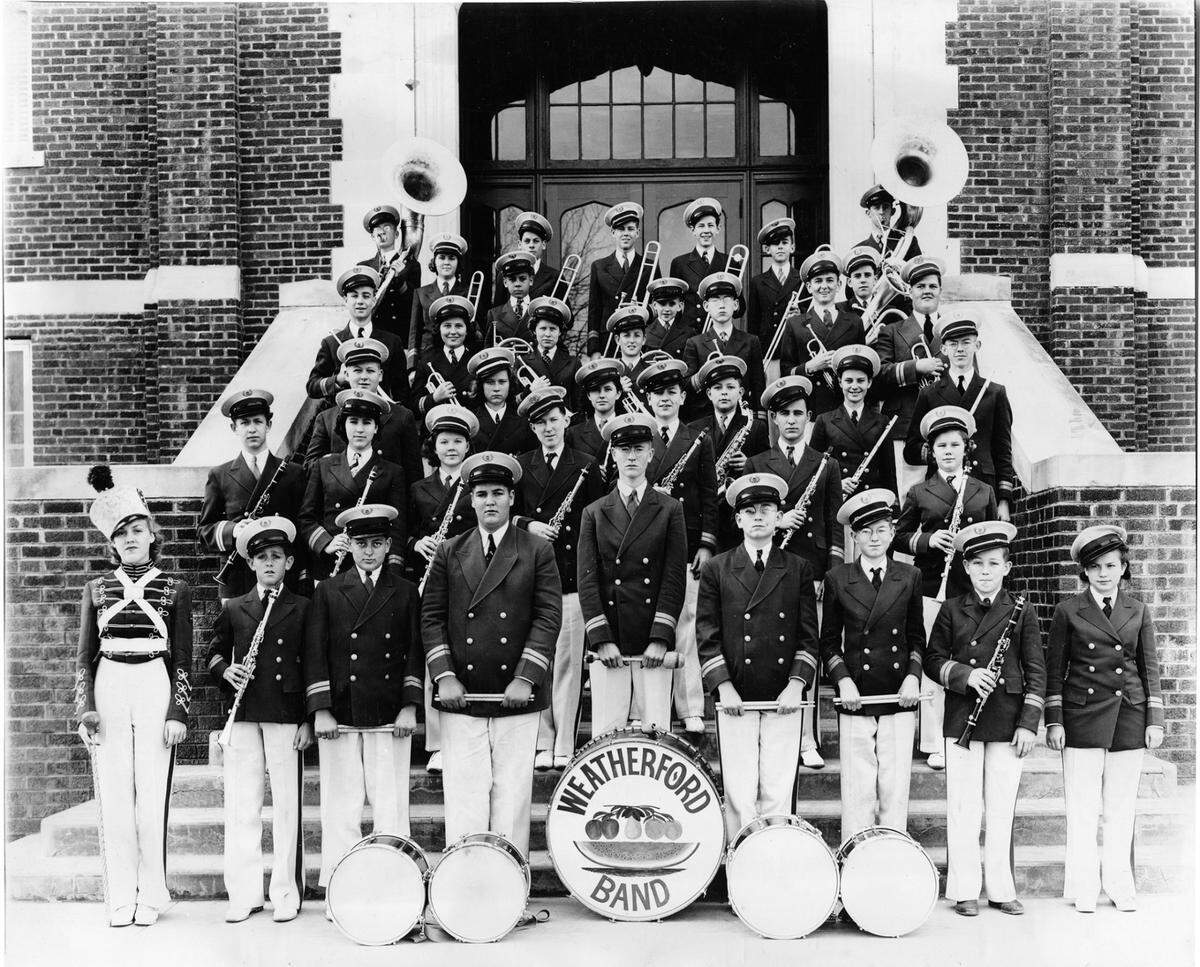 March 27, 1939: Weatherford High School marching band on the steps of the school, Weatherford, Texas.