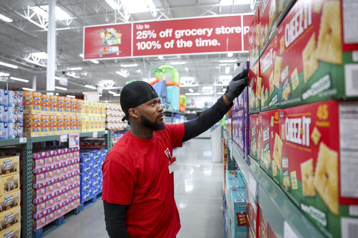 Overnight stocker Rashad Hornsby straightens snacks as the store prepares for its Spring 2026 opening, on Friday, April 24, 2026 in Fort Worth, Texas. BJ's Wholesale Club will open its first location in Fort Worth at 7241 Harris Parkway.