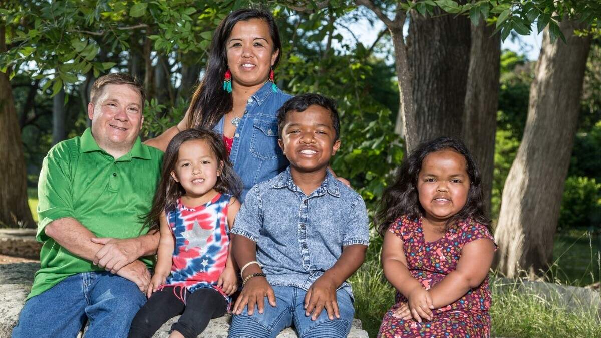 The Thomas family today: John with wife Becca and children Aria, Phillip and Alani. John started the Joseph Thomas Foundation in memory of his late son Joseph, who died in 2007 at age 6, to benefit families with special needs children.