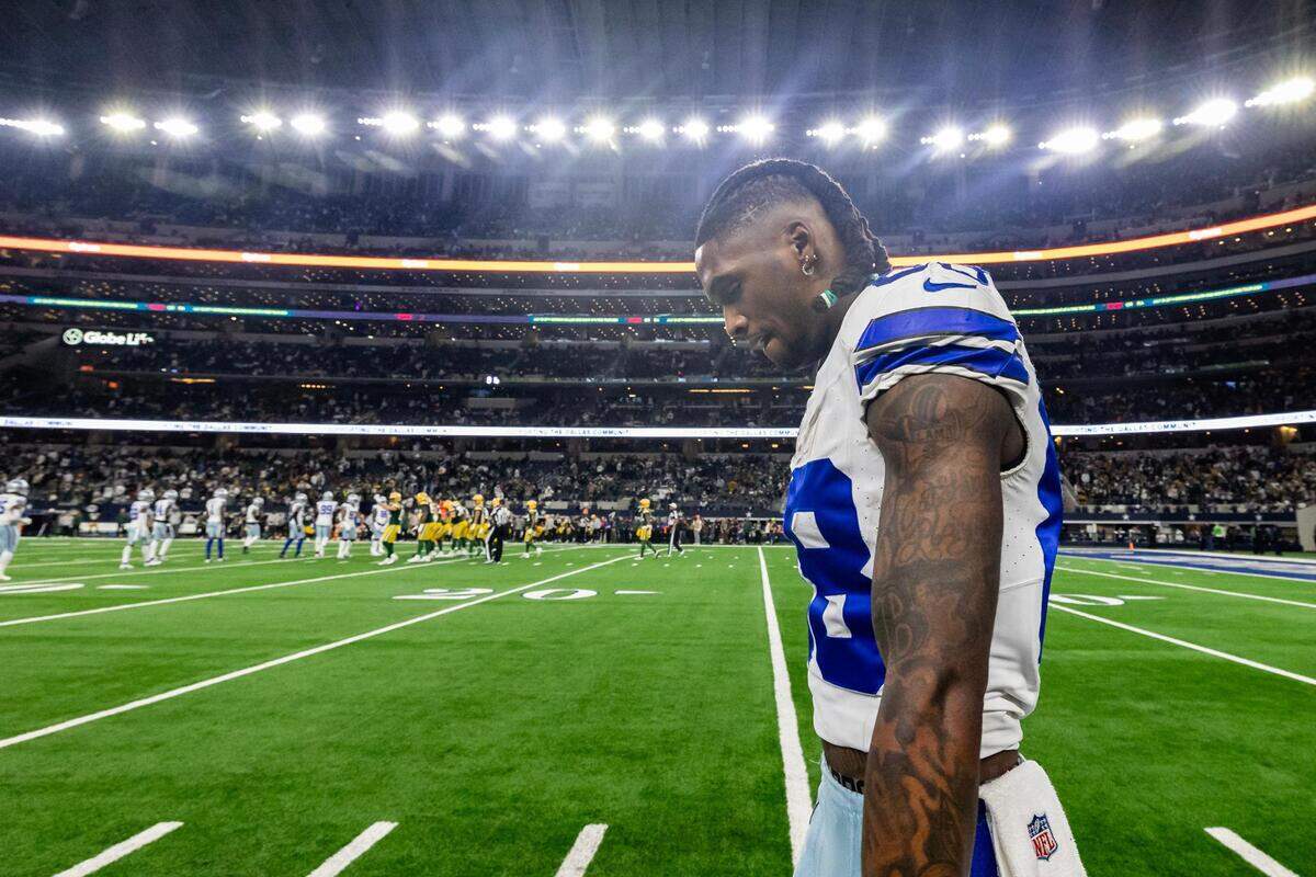 Cowboys wide receiver CeeDee Lamb (88) walks off the field after losing the NFC Wild Card game against the Green Bay Packers at AT&T Stadium in Arlington on Sunday, Jan. 14, 2024. The Packers won 48-32.