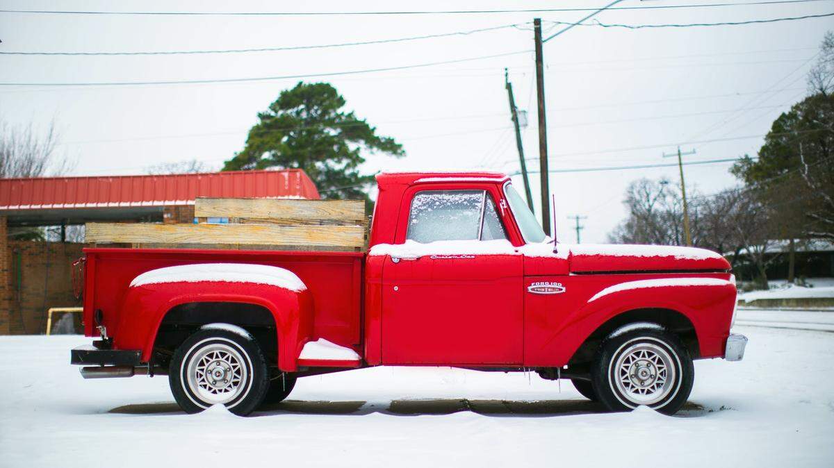 Can a truck in Texas be left running on driveway in the cold? Texas law says no. A vehicle cannot be left unattended with keys in ignition to prevent theft. Start up the truck remotely, then it’s legal. Stock image.