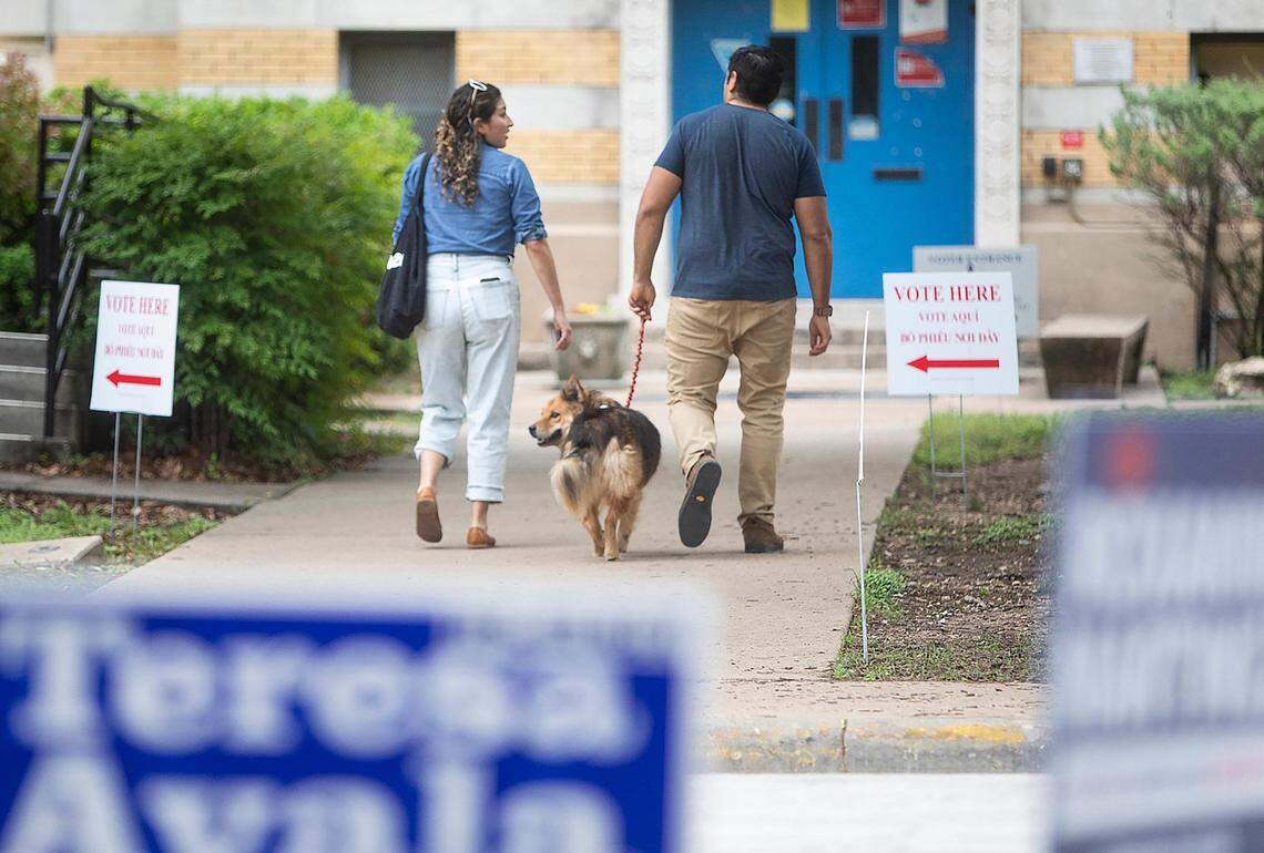 Voters enter De Zavala Elementary School in Fort Worth in 2021.