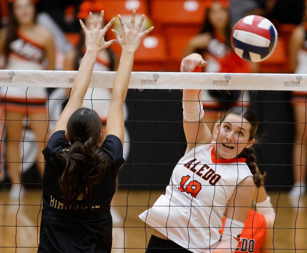 Aledo middle blocker Ella Isabell (18) returns the ball to the Birdville side during a UIL Region 1-5A Bi-District volleyball match at Wilkerson Greens Activity Center in Fort Worth, Texas, Tuesday, Nov. 05, 2024.