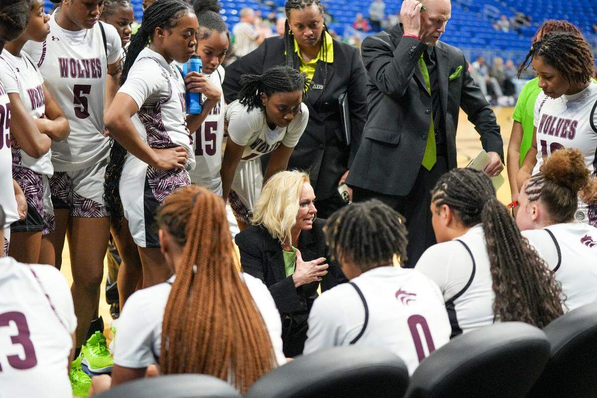 Mansfield Timberview coach Kit Kyle addresses her team during a time out against against Cedar Park in a Class 5A state semifinal on Thursday, February 29, 2024 at the Alamodome in San Antonio, Texas. Timberview defeated Cedar Park 67-45.