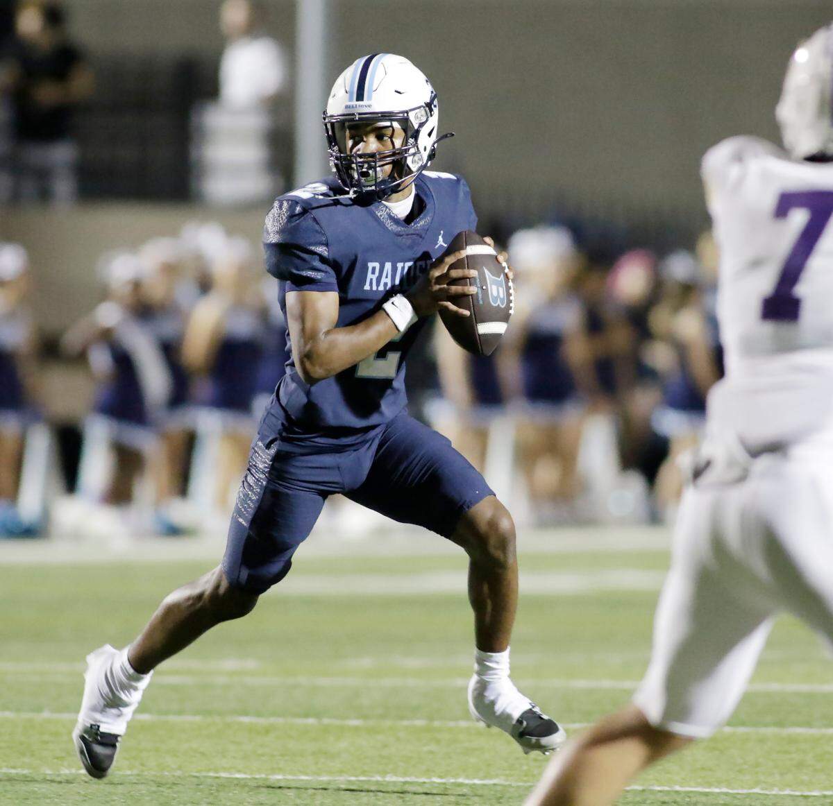 L.D. Bell’s Cameron Johnson looks for a receiver during their game UIL football game with Timber Creek Friday night at Pennington Field in Hurst on Friday Sept. 6, 2024.