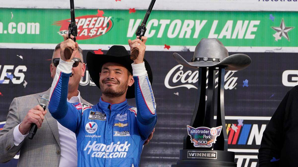 Kyle Larson celebrates after winning a NASCAR Cup Series auto race at Texas Motor Speedway in October 2021. The circuit returns this year in September.