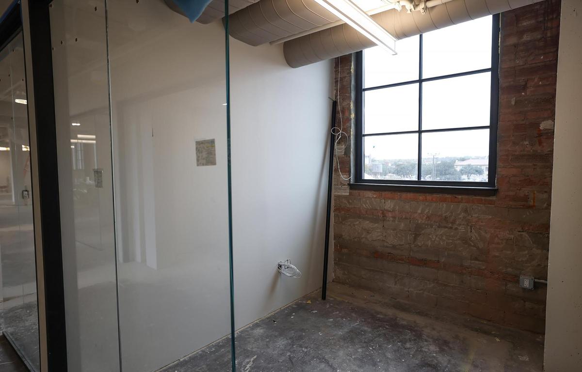 Renovations continue on the Armour building in the Fort Worth Stockyards on Friday, Dec. 6, 2024. Exposed brick was retained where it occurred to stay true to the original building.