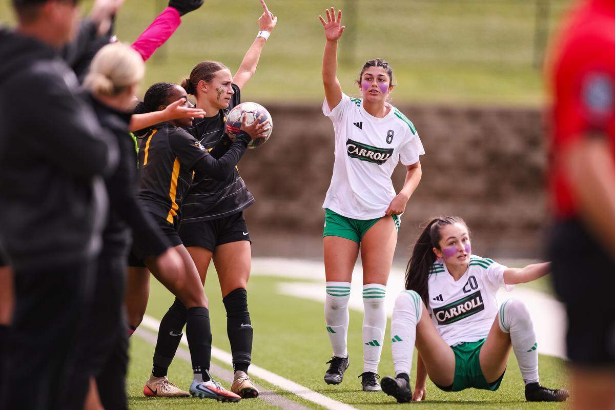Southlake Carroll defender Lexi Khan (8) and midfielder Maura Hayes (20) make an appeal to the official on an out of bound play against Forney in a UIL Class 6A Division 2 girls soccer state semifinal on Saturday, April 4, 2026, at Memorial Stadium in Mesquite, Texas.