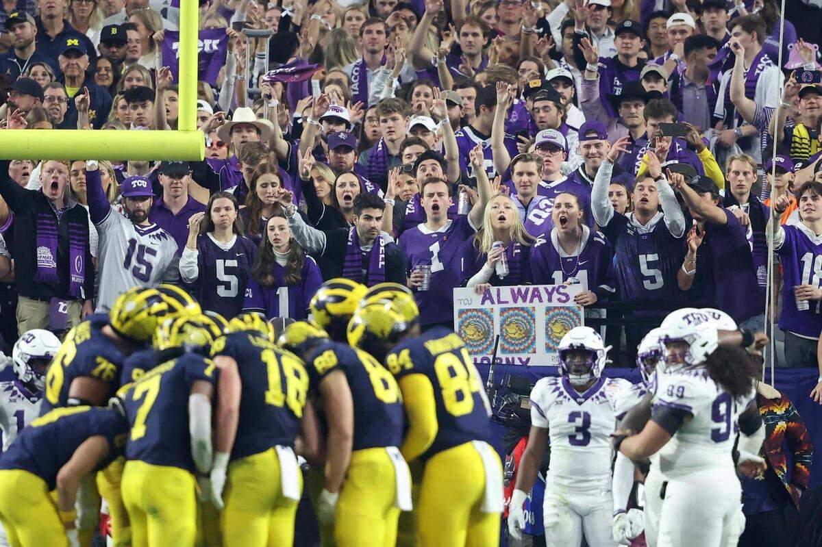 TCU fans make noise as the Michigan offense nears the end zone during the Vrbo Fiesta Bowl at State Farm Stadium in Glendale, Ariz., on Saturday, December 31, 2022.