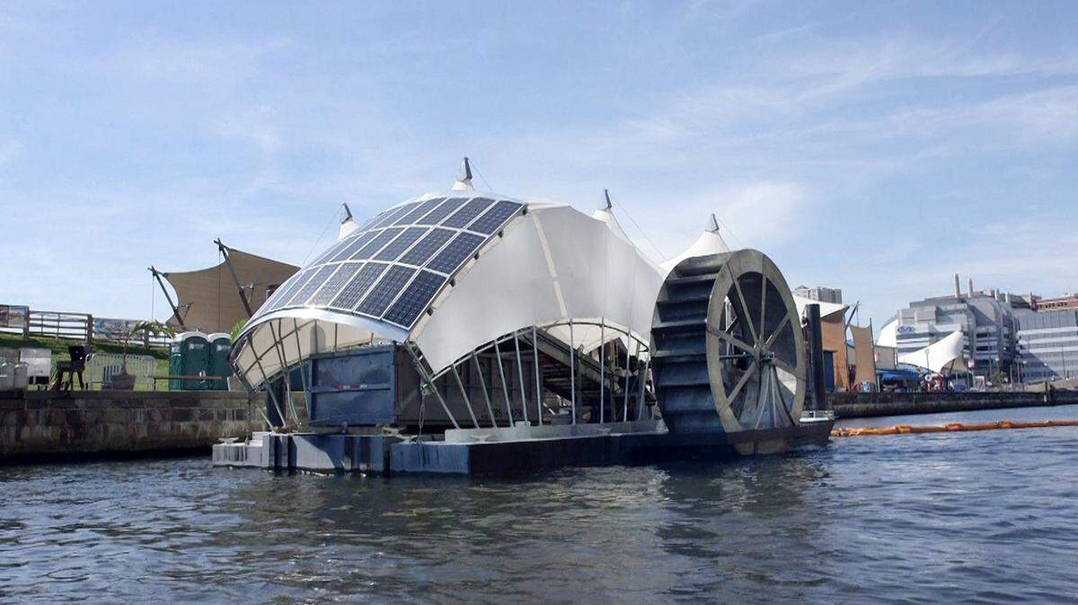 A photo of the trash collecting water wheel in Baltimore Harbor.