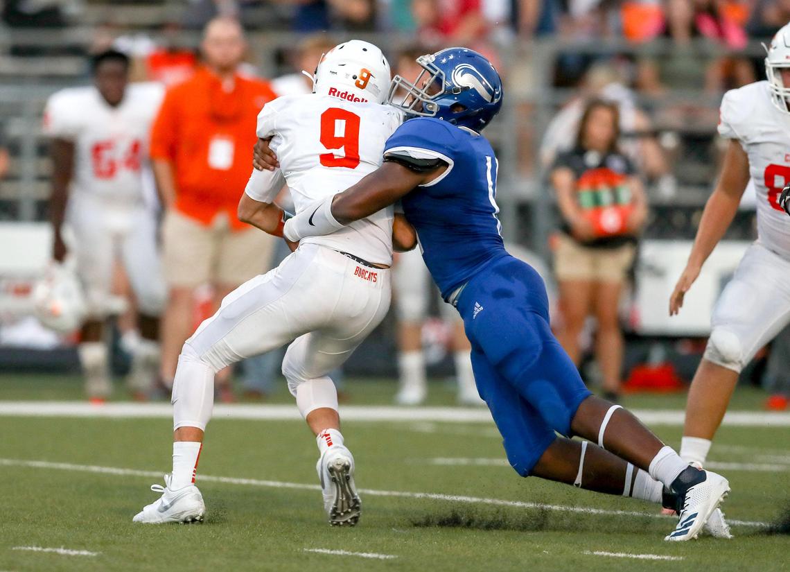 Nolan defensive lineman J’Dan Burnett (R) sacks Celina quarterback Hunter Watson (9) during the first half, Friday night, September 13, 2019 play at Doskocil Stadium in Fort Worth, TX.