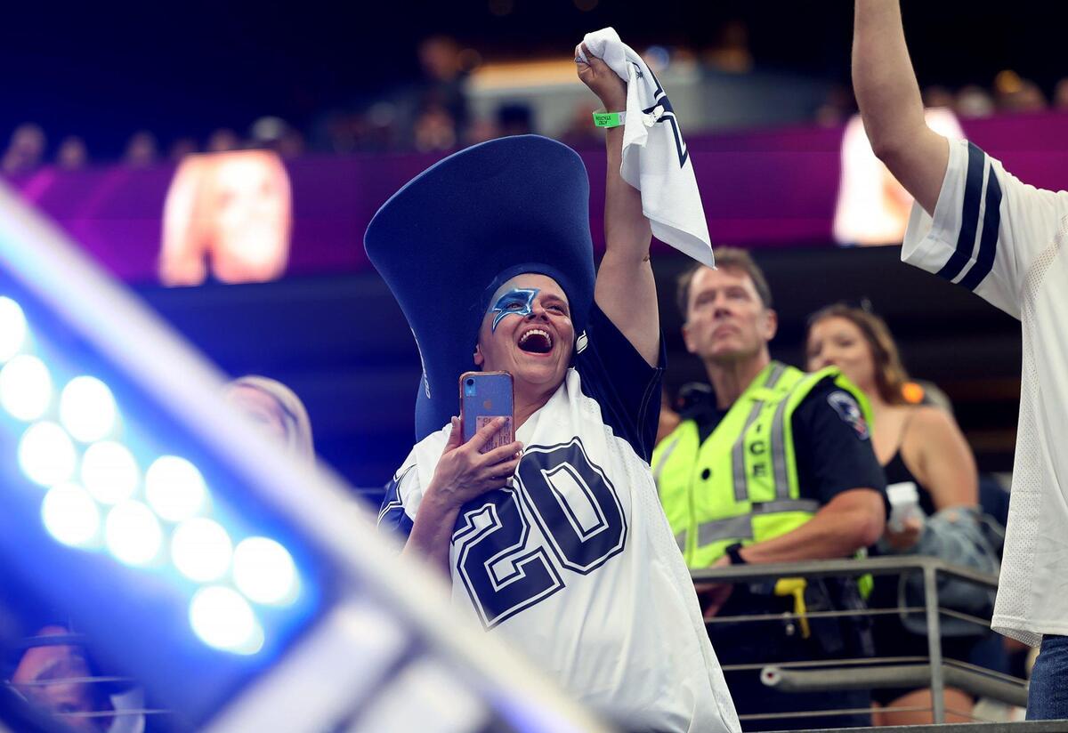 Fans cheer as the Dallas Cowboys take the field for a preseason matchup against the Jacksonville Jaguars on Saturday, August 12, 2023, at AT&T Stadium in Arlington.