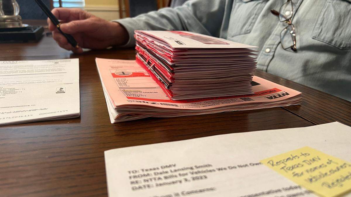 The stack of bills from NTTA recieved by Dale and Anne Smith for 11 cars they do not own.