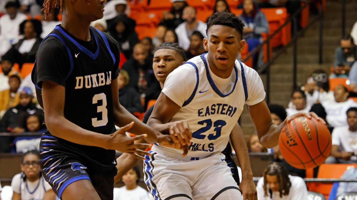 Dunbar’s Reginald Wilson (3) defends Eastern Hills guard Kamden McGilveary (23) in the third quarter of a high school basketball game at Wilkerson Greines Activity Center in Fort Worth, Texas, Saturday, Jan, 27, 2024.