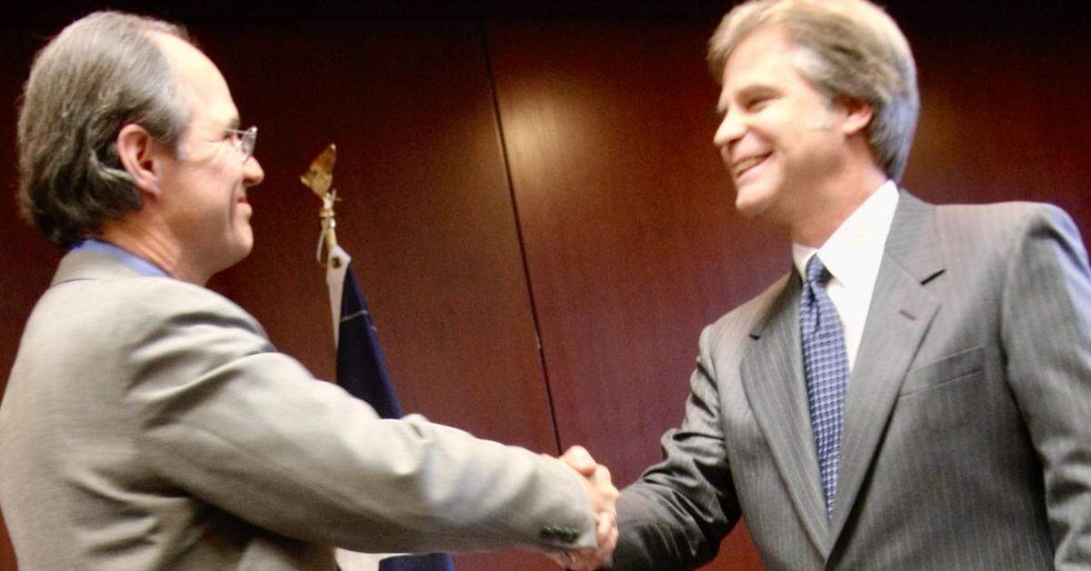 State Rep. Dan Barrett, right, is sworn in Dec. 31, 2007, as state representative for District 97 by his friend Ken McAlister, a notary public. He won a runoff to finish the unexpired term of state Rep. Anna Mowery.