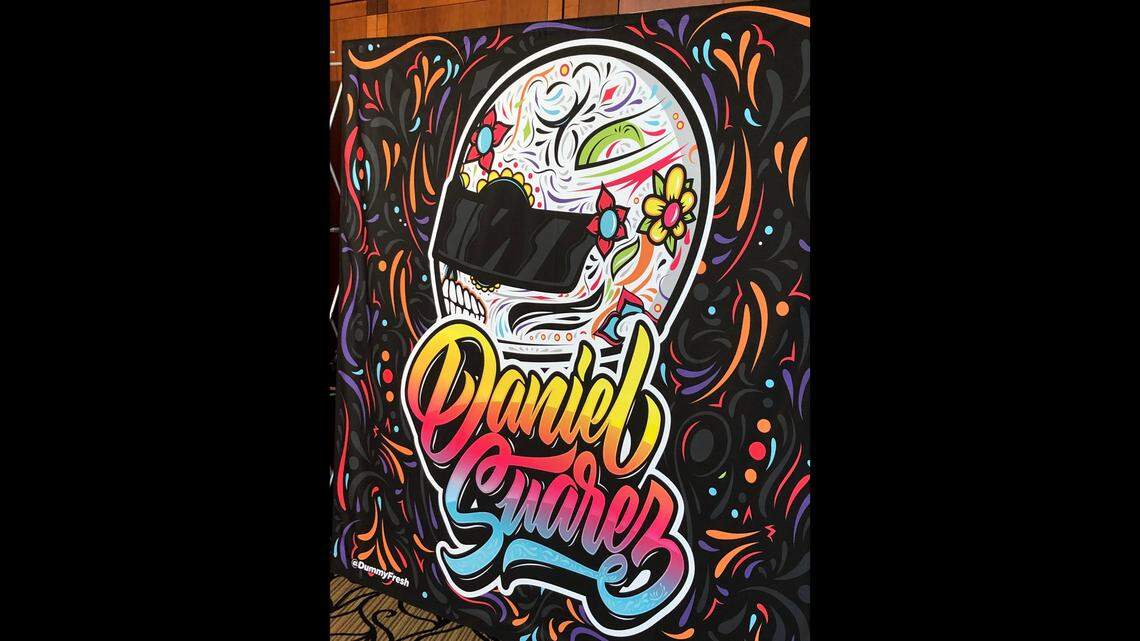 Dallas resident Agustin Chavez designed NASCAR driver Daniel Suarez’s helmet that he will wear Sunday for the AAA Texas 500 at Texas Motor Speedway. It was inspired by Dia de los Muertos.
