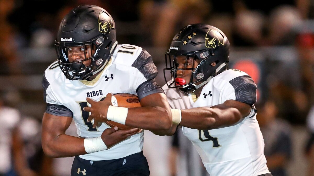 Keller Fossil Ridge quarterback Brandon Lewis (4) hands the ball off to running back Colione Evans (10) during the first half, October 4, 2018 played at Northwest ISD Stadium in Justin, TX.