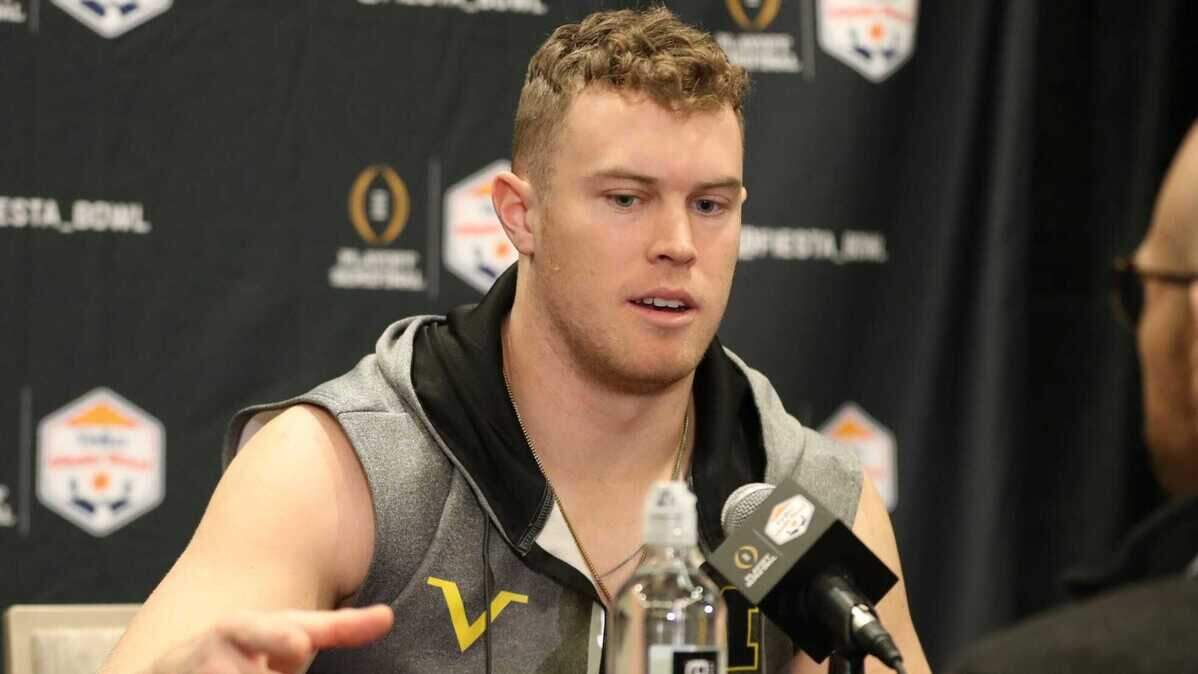 Michigan tight end Luke Schoonmaker talks with reporters before the Fiesta Bowl against TCU on Thursday, Dec. 29, 2022, in Scottsdale, Arizona.