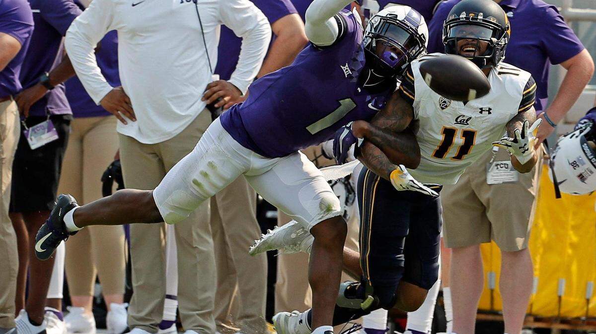 TCU cornerback Tre’Vius Hodges-Tomlinson (1) defends a pass to Cal wide receiver Kekoa Crawford (11) during their game in 2021.