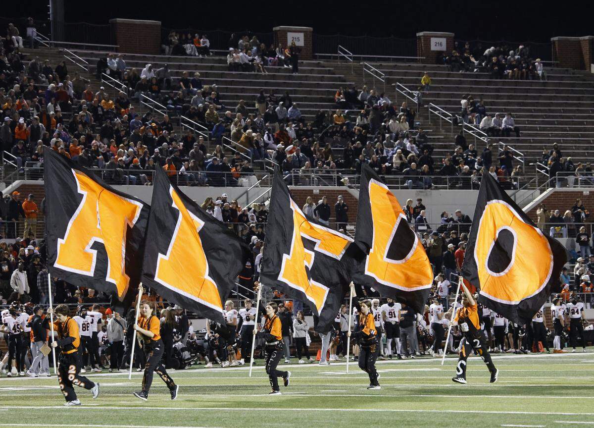 The Aledo Bearcats celebrate a touchdown against Frisco Lone Star during the first half of a UIL Class 5A Division I Semifinal on Friday Dec. 12, 2025 at Vernon Newsom Stadium in Mansfield, Texas.