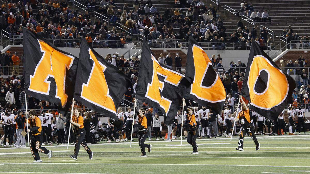 The Aledo Bearcats celebrate a touchdown against Frisco Lone Star during the first half of their Class 5A Division I state semifinal Dec. 12 at Vernon Newsom Stadium in Mansfield.