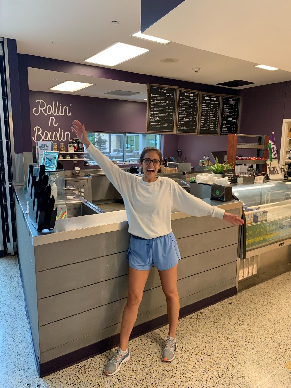 Sophia Karbowski in front of the first ever Rollin’ and Bollin’ brick and mortar location at TCU Campus Recreation Center.