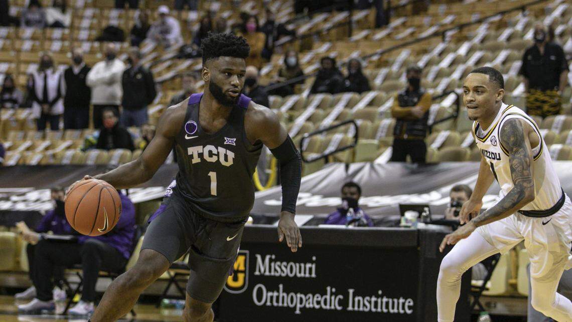 TCU’s Mike Miles (left) led the Horned Frogs in scoring Saturday at Missouri in the SEC/ Big 12 Challenge.