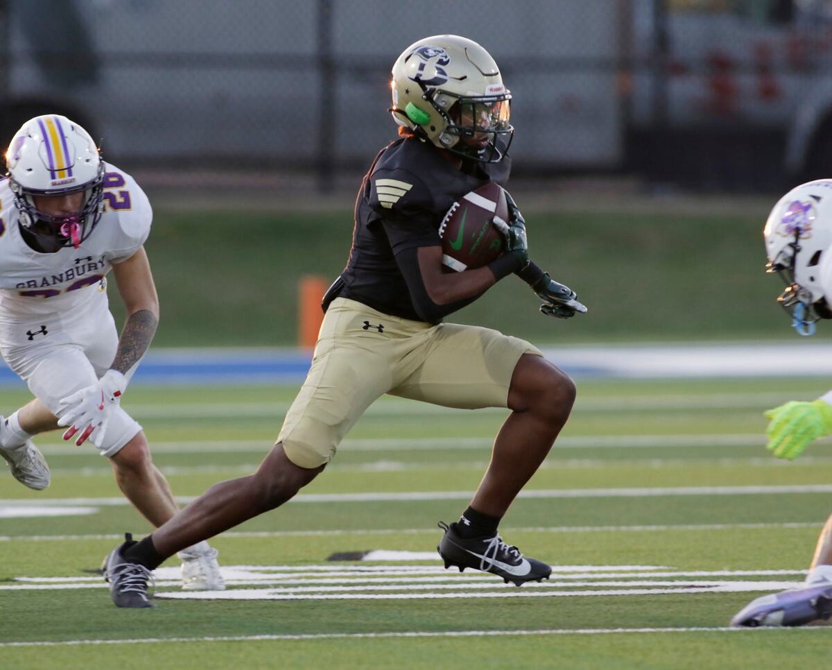 Birdville’s Mark Hicks finds a hole in the Grandbury defense during their game Thursday night at Birdville Athletic Center. JOHN ROWLAND