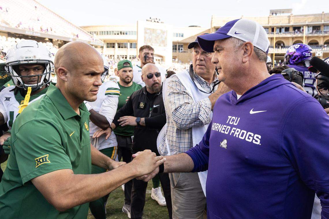 Baylor head coach Dave Aranda, left, and TCU head coach Sonny Dykes, right, greet each other following a Big XII football game between the TCU Horned Frogs and the Baylor Bears at Amon G Carter Stadium in Fort Worth on Saturday, Oct. 18, 2025.