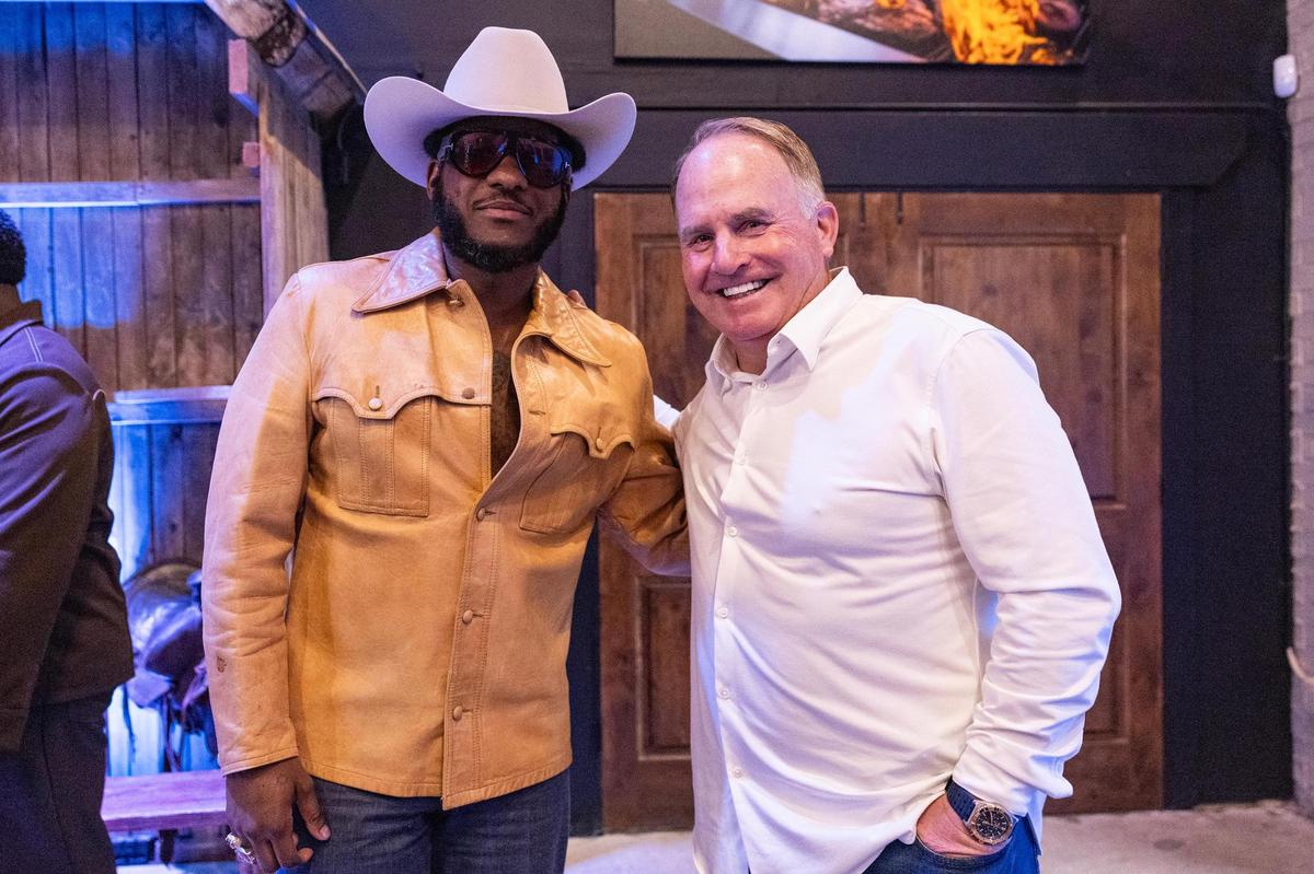 Musician Leon Bridges and former TCU Head Football Coach Gary Patterson are photographed together at their charity ‘The Big Good’s annual fundraiser ‘The Big Night’ at the River Ranch Stockyards in Fort Worth on Thursday, April 3, 2025.