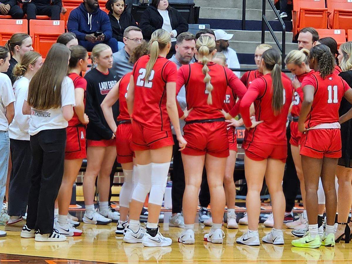 Argyle head coach Chance Westmoreland, center, talks to his team during a time out against Mansfield Summit in a Class 5A Division 2 area-round game on Thursday, February 13, 2025 at Aledo High School in Aledo, Texas.