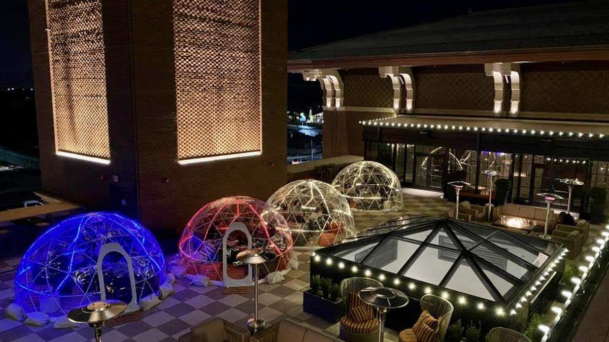 The new Hotel Vin has all-weather bubbles around rooftop bar tables.