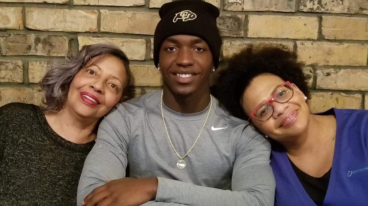 D.J. Oats displays tattoos honoring his mother Kenyetta Denise Phillips and his father Daniel Lamont Oats, Sr. Both parents passed away in a 17-month span before D.J. was finished with his sophomore year in high school.