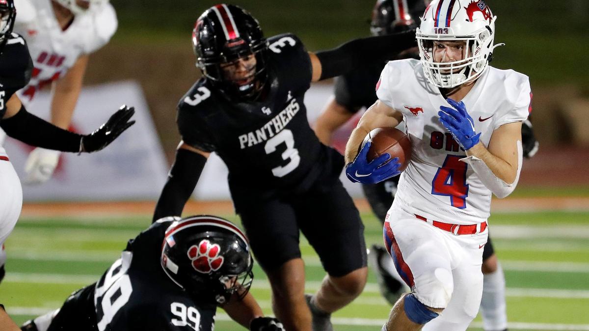 Grapevine running back Parker Polk (4) rushed for 228 yards and five TDs in a win over Abilene Cooper.
