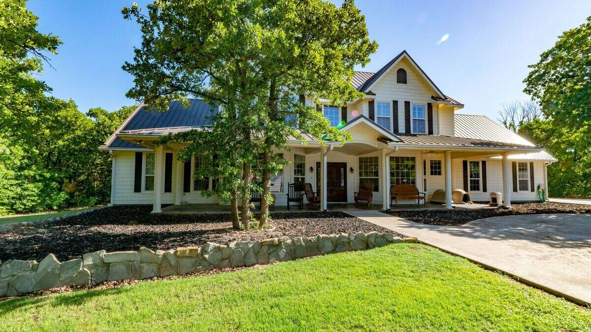 The rural property at 7701 N. FM 113 is tucked away on 34 scenic acres.