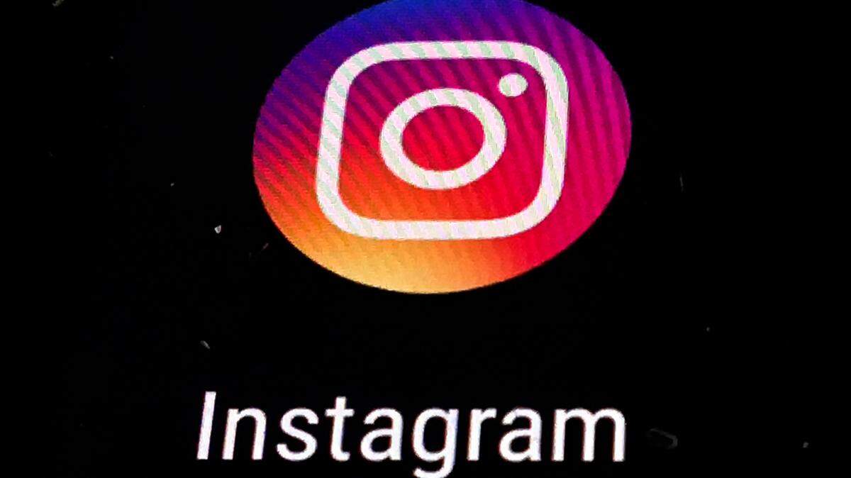 FILE - In this Thursday, Nov. 29, 2018, file photo, the Instagram app logo is displayed on a mobile screen in Los Angeles.