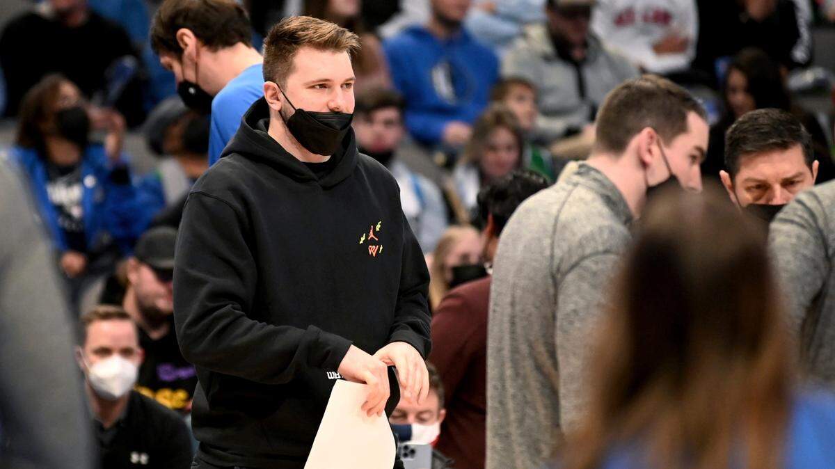 Dallas Mavericks guard Luka Doncic entered the NBA’s health and safety protocol, along with teammate Trey Burke, after testing positive for COVID-19 on Wednesday.