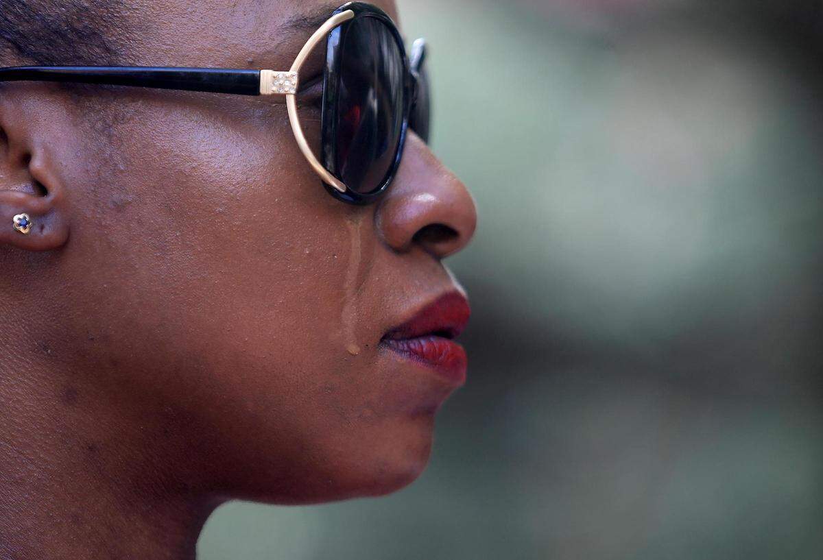 A tear runs down Shanelle Jenkins cheek as she attends a rally in May demanding changes at Tarrant County’s jails after more than three dozen inmate deaths in recent years, complaints of policy violations and neglect. Jenkins’ husband Robert Geron Miller, died in the Tarrant County Jail in 2019 after being arrested on misdemeanor warrants.
