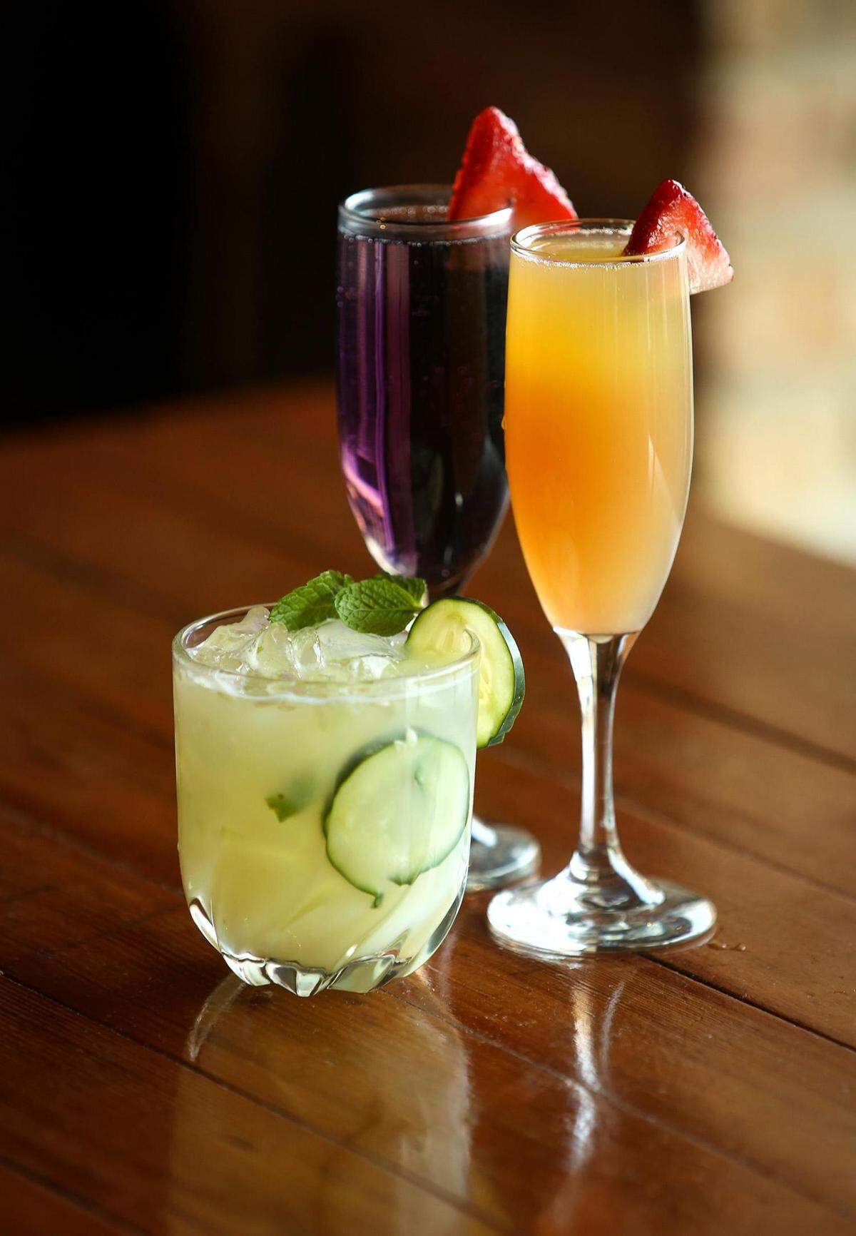 Brewed has many brunch cocktails, including the Southwest Rita, left, “Fight Em On The Ice” mimosa, center and Harison Ford mimosa.
