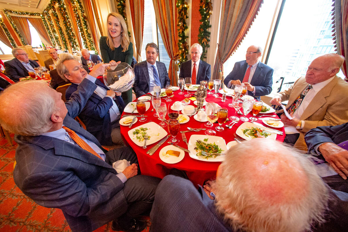 Fort Worth Mayor Mattie Parker collecting donations from Exchange Club members at its Goodfellows luncheon fundraiser at the Fort Worth Club Wednesday, Dec. 7, 2022. Republican political consultant Karl Rove spoke at the event.