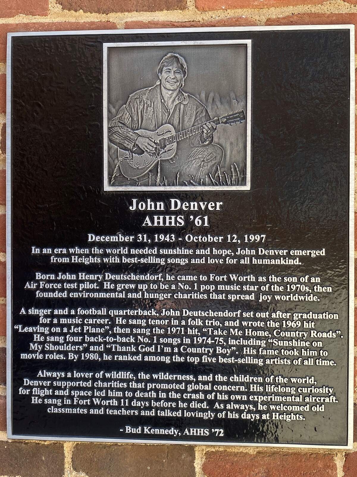A plaque at the Arlington Heights High School auditorium in Fort Worth, Texas, remembers singer John Denver.