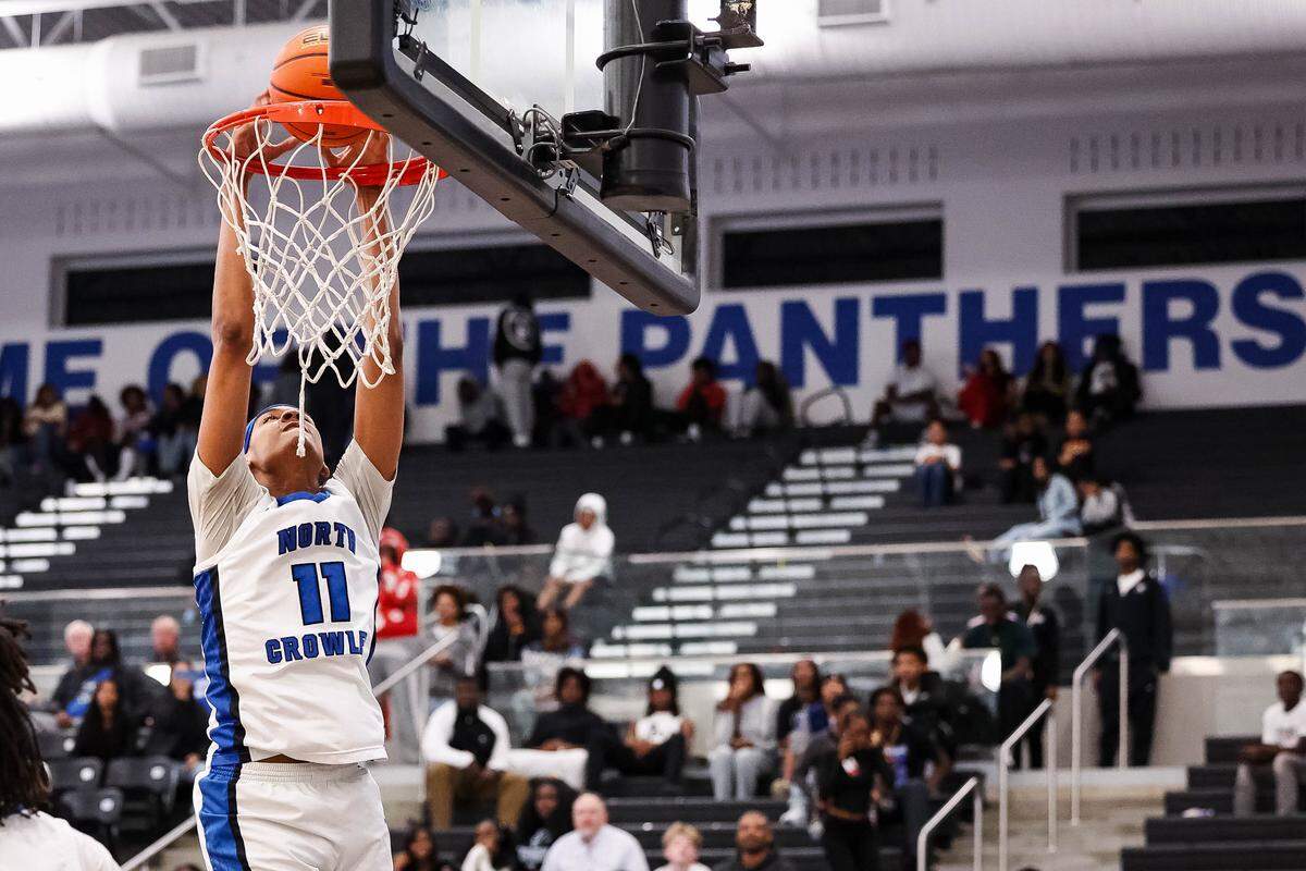 North Crowley forward Trey Hall goes up for a dunk in a District 3-6A matchup against Weatherford on Friday at North Crowley.