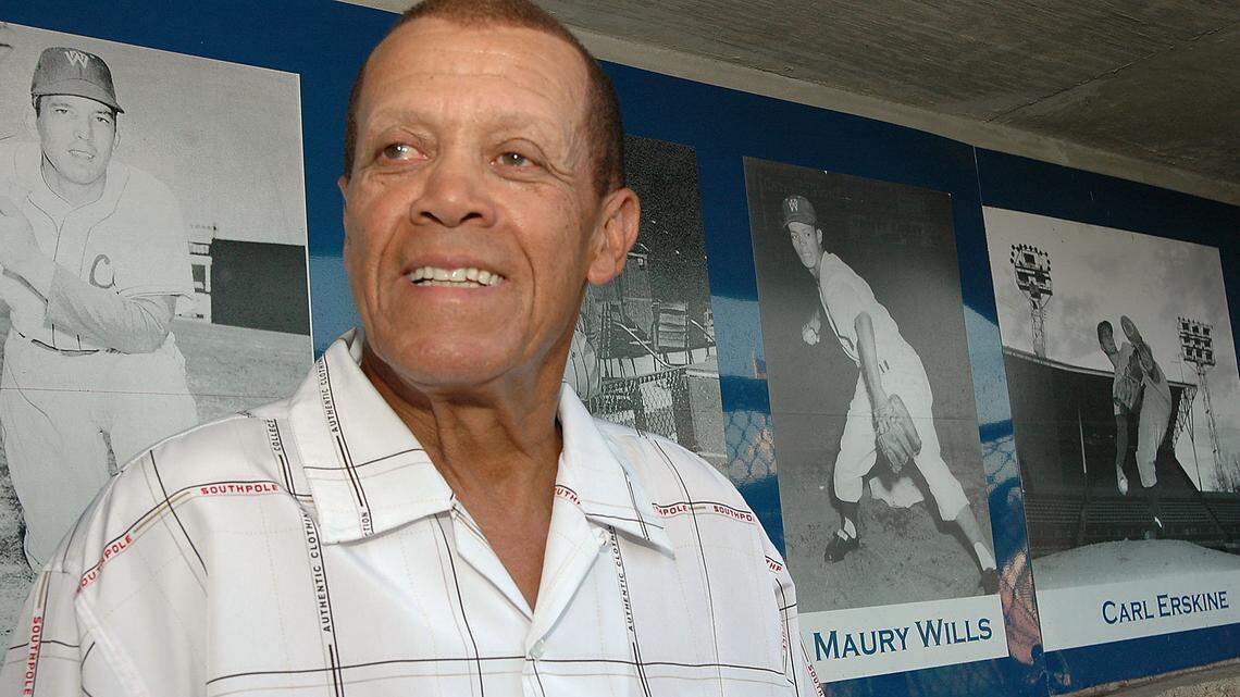 Former Fort Worth Cats player Maury Wills sits in the third base dugout of La Grave Field, where his picture hung. The Cats retired his number on June 9, 2005. Wills died Monday at 89.