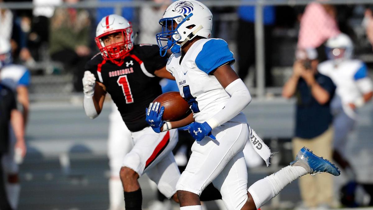 Fort Worth Christian defensive back Houston Buckner (1) chases Southwest Christian running back Darion Gipson after a kickoff during the TAPPS Division II Regional Final at Castleberry High School in Fort Worth, Texas, Saturday, Dec. 05, 2020. Southwest Christian Lions defeated Fort Worth Christian Cardinals 35-28. (Special to the Star-Telegram Bob Booth)